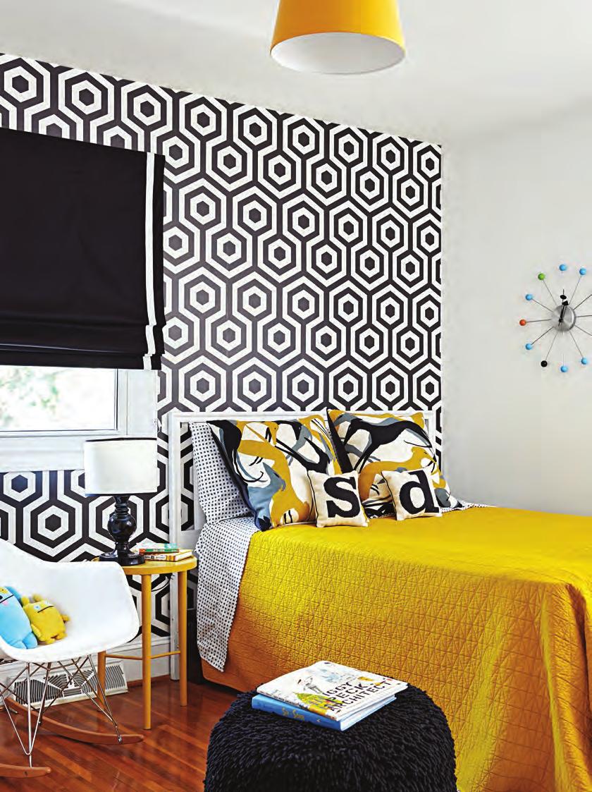 16 Painting son Sutton s bedroom white keeps the attention on the accent wall of hexagon-pattern paper in dramatic