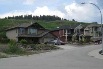 In addition, a large portion of the property north of Blackcomb Way is zoned for low density hillside residential development, which allows for single family housing, semi-detached housing and