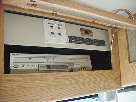 Also, two people can watch different programs on the two TV s while taping a third program on the VCR. While parked (with key off) - press Radio Power switch to House position.