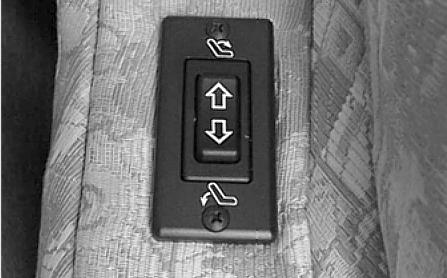 To Recline: Press the switch on the front of the armrest.