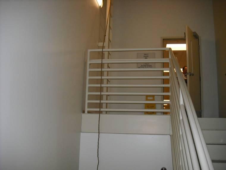 Openings in Exit Enclosures That means a door to a mechanical room at the top of a