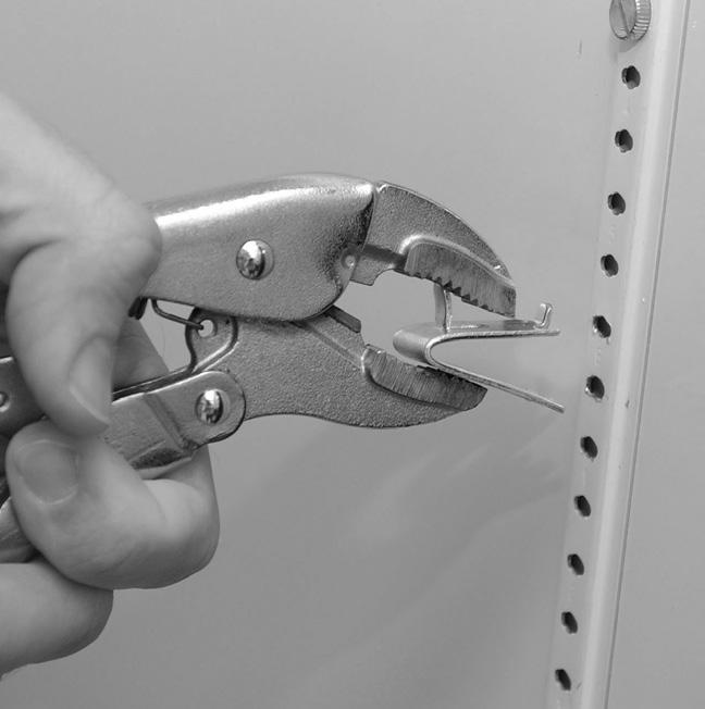 WARNING! Do not use pliers or any crimping tools when installing shelf clips.