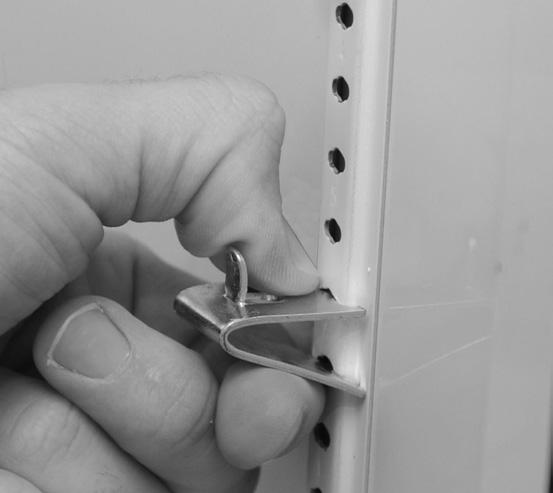 (See image ). STEP Bottom tab of the shelf clip will fit tightly.