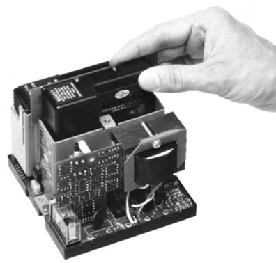 INSTALLING THE PROGRAMMER AND AMPLIFIER MODULES WARNING: Remove power from the control before proceeding. FIGURE 1.