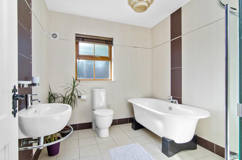 pedestal wash hand basin, fully tiled shower cubicle, ceramic tiled