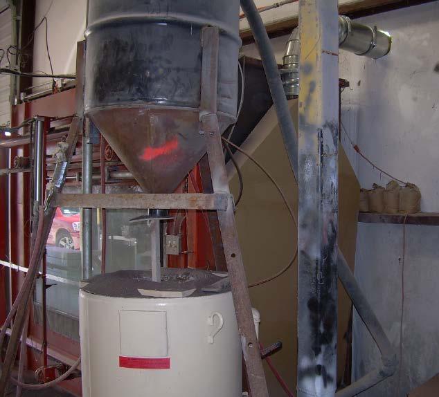 Two Sand blast booths located inside the facility with ducting to