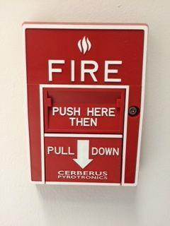 In the event of a fire the smoke alarm system can be activated manually by pulling down the arm on any of the fire alarm units found in the area.