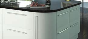 The wide pan drawers, clear glass wall units and curved
