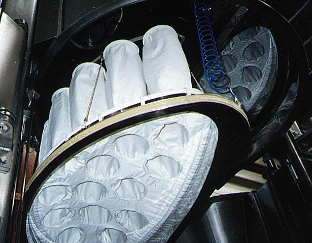 The Machine Tower Components The vast majority of fluid bed systems incorporate the use of fabric filters (as shown). The two dominant considerations are: A.