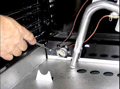 Replace the nozzle using the conversion set supplied with the range or by a Bertazzoni