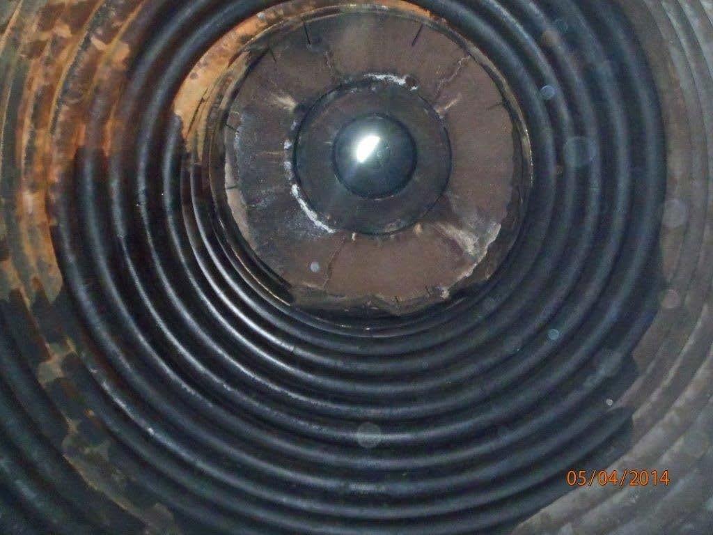 It is concluded that the port thermal oil heater coil failed as a result of stress caused by the weld securing the refractory insulation support plate.