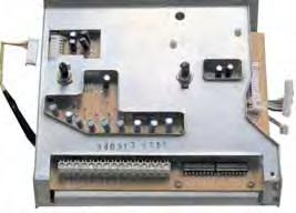 Remove the 2 Phillips-head control board screws and two 11-mm hex nuts that hold the control board in place (see photo). 6.