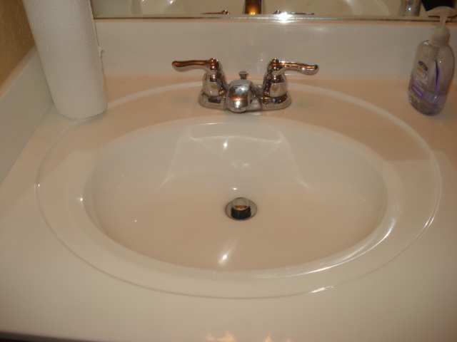 Picture #57 Sink and Faucets Picture # 58 Inside Cabinet