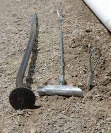 Three Details that Make a Big Difference Something called wiggle wire is the best option for anchoring plastic along the edges of your hoop house.