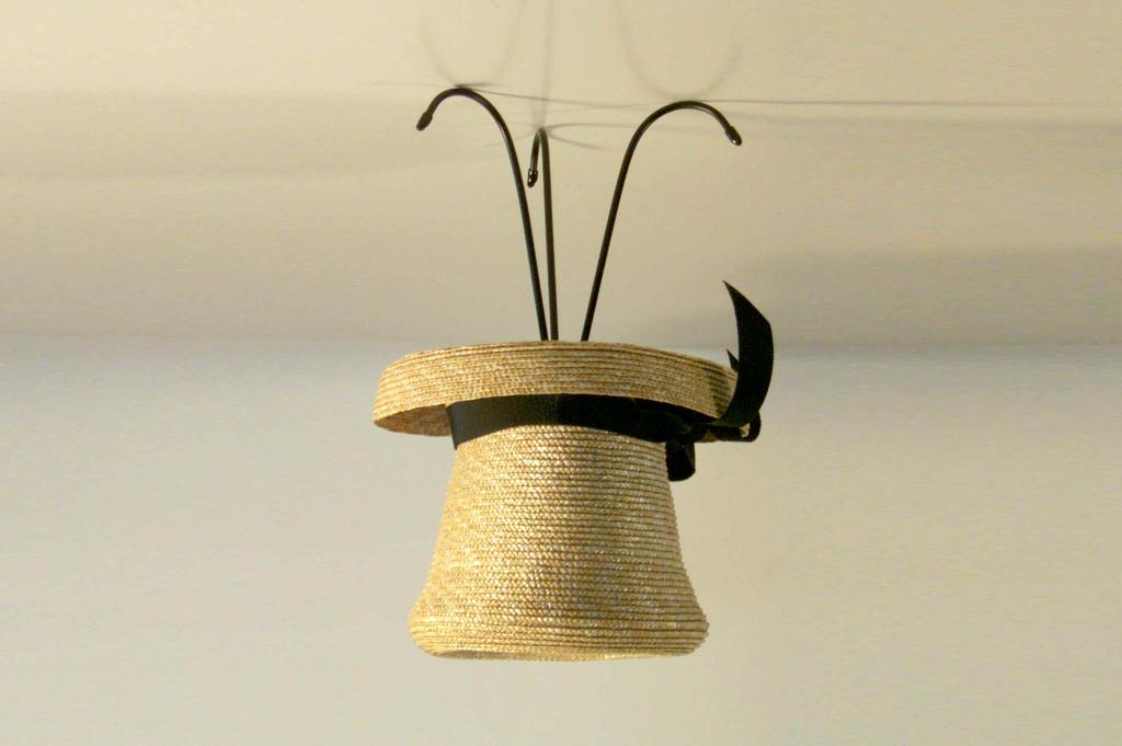 Mini The Mini Hat Table Lamp Our smallest but most mighty table lamp comes in natural straw with a perfect black ribbon.