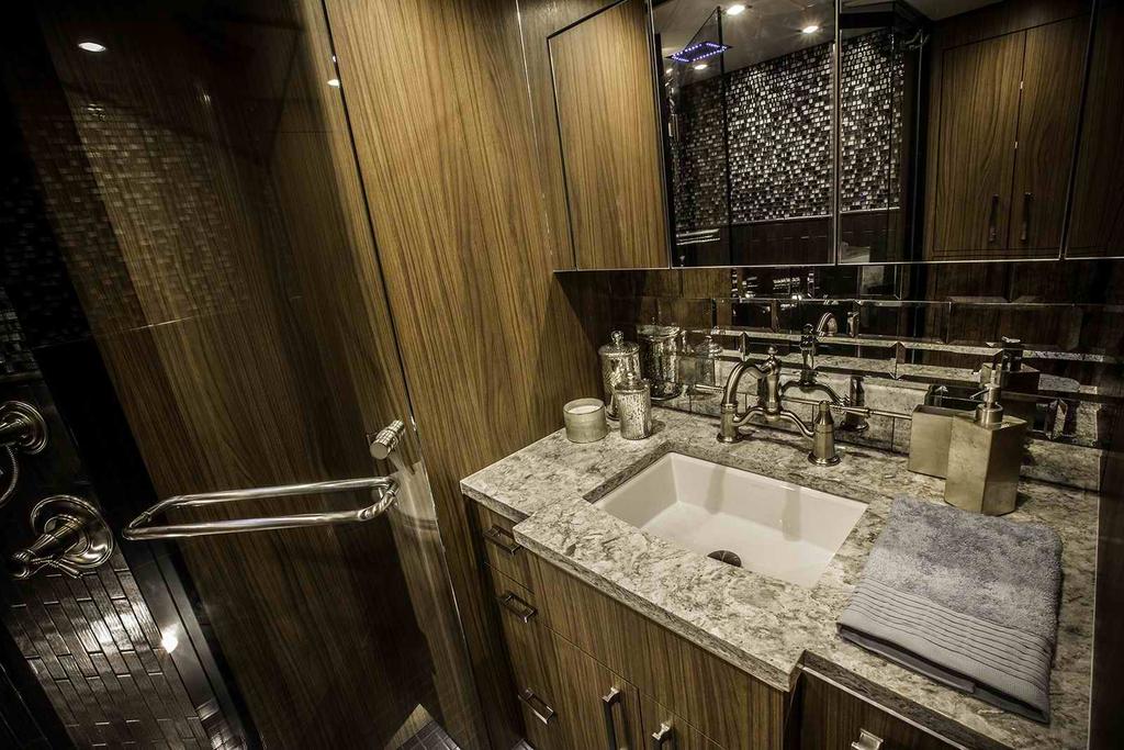 The Master Bath vanity features custom antique tile backsplash.