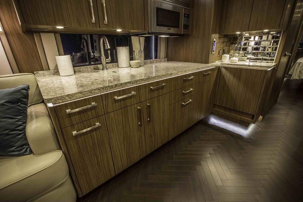 The Galley is located in the patio side slide room, and is well equipped and thoughtfully designed.