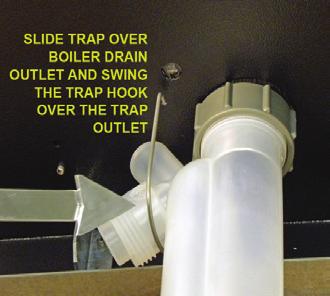 Remove the trap from the boiler (reverse the installation procedure