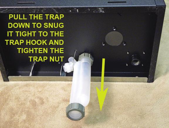 Remove the Trap Cleanout Assembly (H), from the Trap Body and clean and