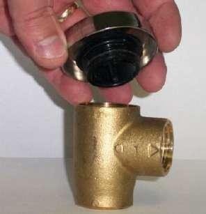 SERVICE VACUUM BREAKER REPAIR KIT STEPS 3. Remove the top cap by gripping firmly and turning to the left.