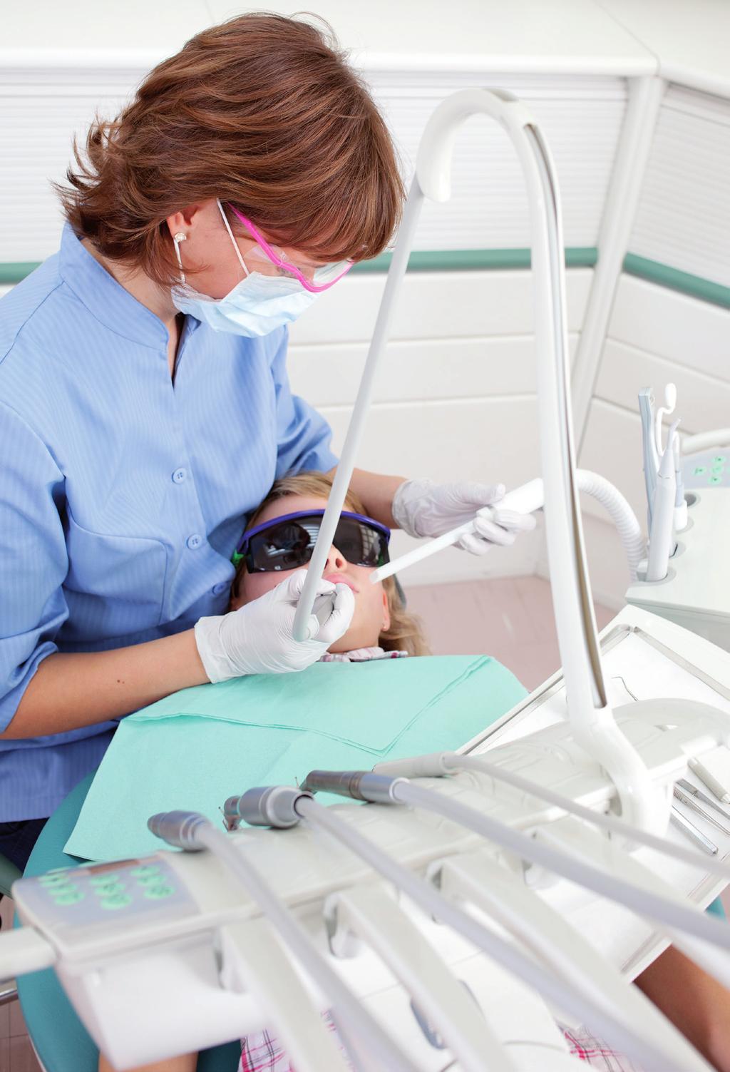EVERYTHING WITHIN REACH Instruments, trays, suction head, and cuspidor are all easy to reach
