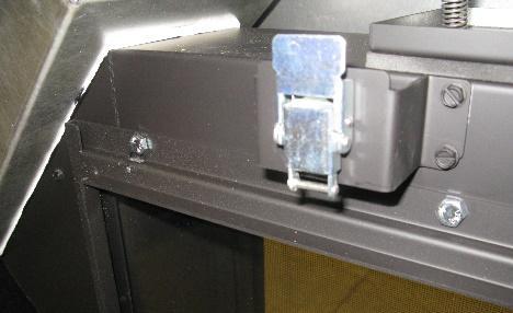 Confirm that the Screen latches are in their home position. (see image 1.