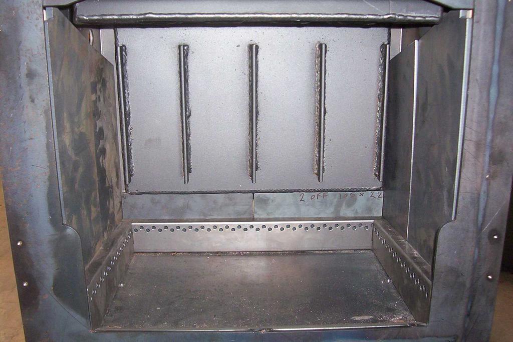 When a Wooden mantle is intended to be installed, at least 18-24 (460-600mm) clearance is required to the stove.