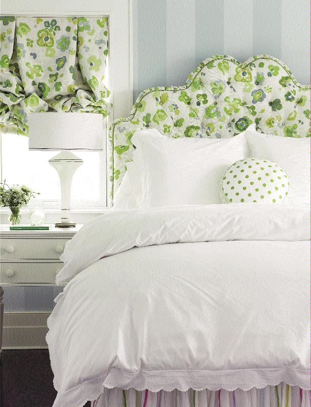 traditional yet still fresh island look. Oceanic hues and floral prints create a serene escape in a guest room.