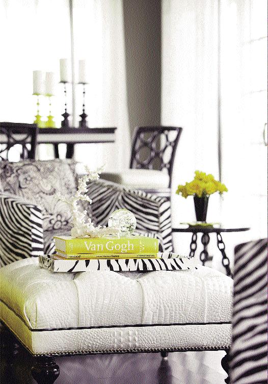 Formality and whimsy form a glamorous combo in the living room, where zebra prints and a