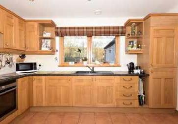 The property benefits from beautifully appointed and spacious accommodation including lounge with wood burner, bright sunroom, lovely kitchen, dining room, utility room, master en