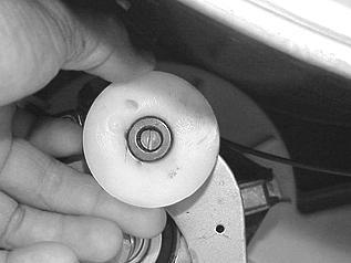 Unscrew the blower wheel from motor shaft. 4. Release the front motor lock from the blower housing. 5.