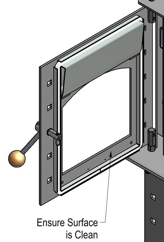 Loosen the 4 Cap screws on the front of the door that retain the glass and remove the bottom glass retainer.