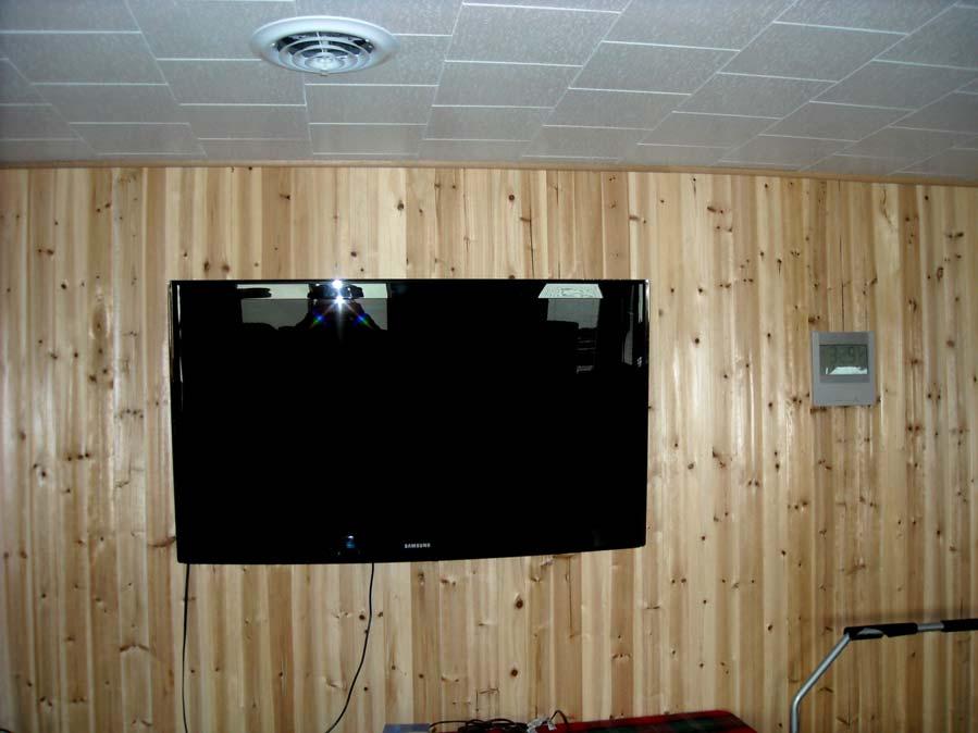 Down stairs living room has 50 inch flat screen TV with satellite
