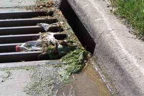 Sidewalks, driveways, streets, and storm drains can