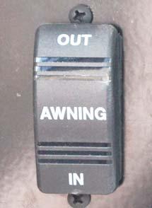 Power Awning Switch (Located near entrance door) -Typical View CAUTION Ignition Lockout System The Ignition Lockout System will disable the extend function while the vehicle ignition key is in the On