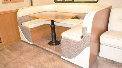 Pull the table leg tubes from the floor or table sockets and store beneath dinette seat. 3. Place the table top onto the ledge of the dinette seat. Place table top onto ledge. 4.