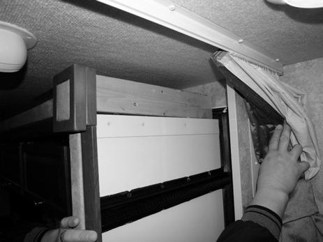 SECTION 10 SLIDEOUT ROOMS 7. When the slideout room is fully retracted, secure the room with a support item (e.g. 2x4 wood board) above the interior slideout room to secure room during travel.
