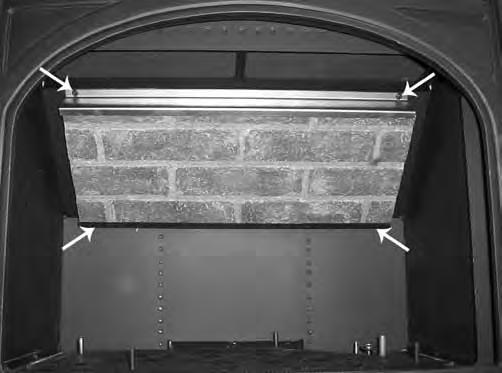 Insert two (2) of the provided screws into the two (2) holes along the bottom of the baffle. Figure 63: Top brick panel in place, screws shown. Figure 64: Back brick panel in place.