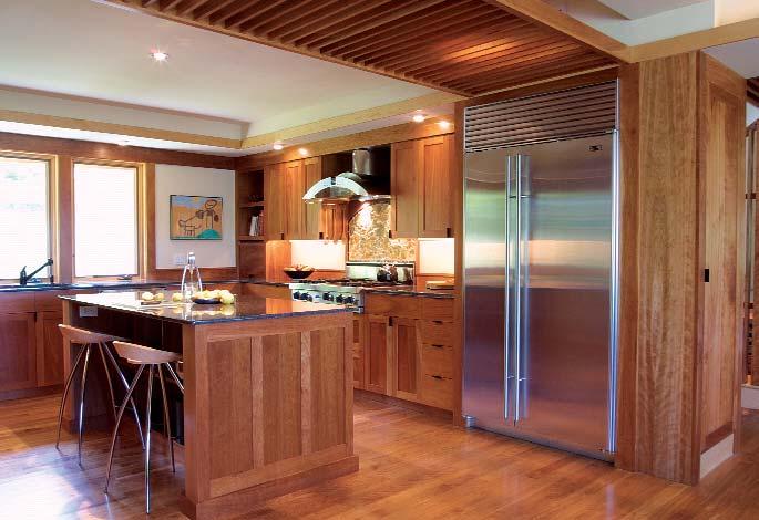 Likewise, guests gathering in the kitchen can move into the dining area.