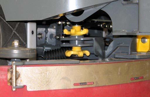 To adjust the overall squeegee blade deflection, loosen the lock knobs on both sides of the machine. NOTE: Make sure the squeegee is level before adjusting the deflection.