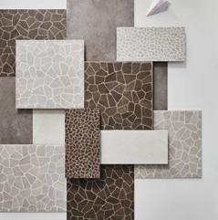 Playing on material and styles, the designer replaces square marble with split wood accents among the Bits field tiles, and uses square marble accents