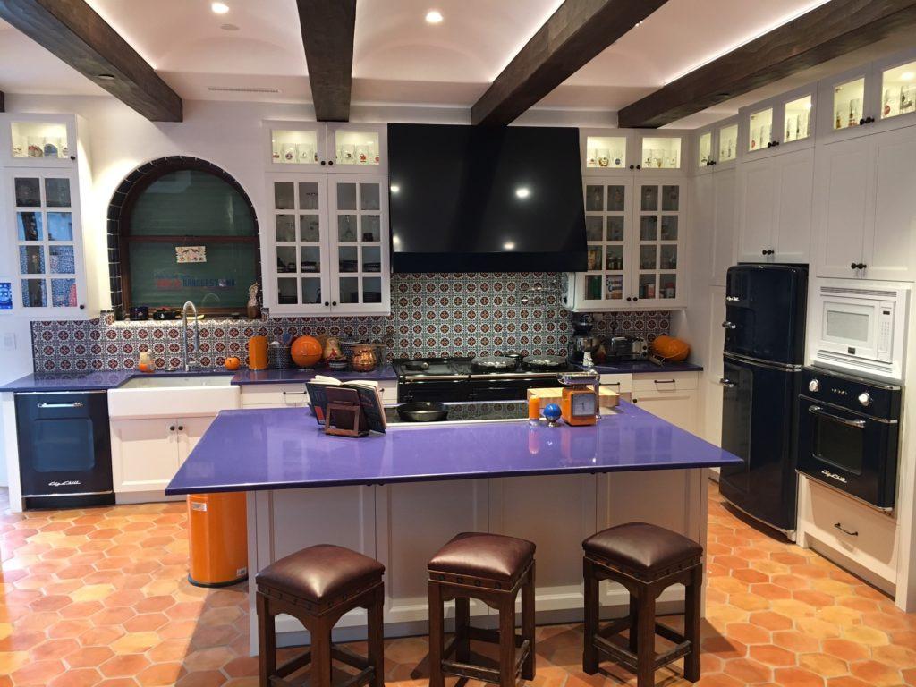 This eye-catching kitchen features Big Chill Retro appliances in black, accented by the bright