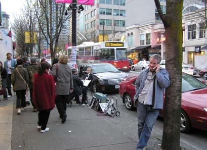 Robson Street, Vancouver (below left) is lined