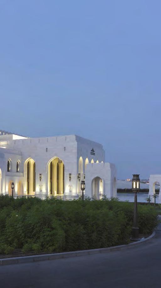 (Clockwise from bottom left) Carefully manicured landscape gardens surround the building; the architecture is inspired by classic Islamic design; the exterior is made with locally sourced Omani