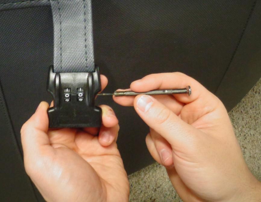 To reset the combination to your own number, first open the buckle, then use a pointed object, such as a