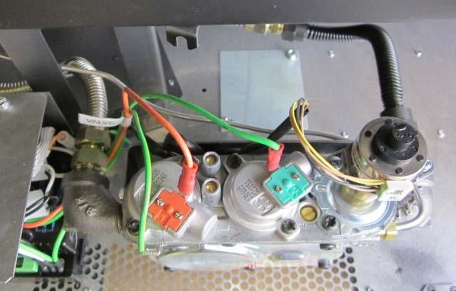 Route the electrical connection through the junction box cover plate and attach to the hookup wires pictured below. Caution: Label all wires prior to disconnection when servicing controls.