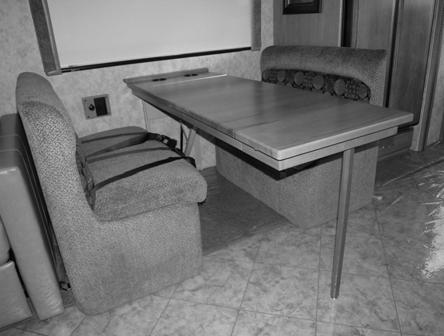 Insert dinette table extension (located under dinette seat, under the