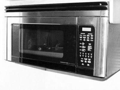 The range hood fan carries cooking odors and gas fumes to the outside of the coach. A light on the underside of the hood provides illumination for food preparation.