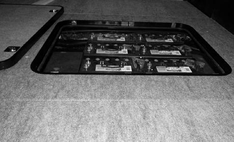 House/Coach Batteries (Shown with floor panel removed) -Typical View Chassis Batteries The chassis batteries are located inside a rear driver side compartment.