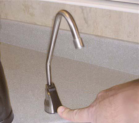 SECTION 7 PLUMBING FILTERED WATER FAUCET If Equipped The filtered water faucet is connected to a flow-through, activated carbon filter cartridge that removes chlorine and odors for taste-free